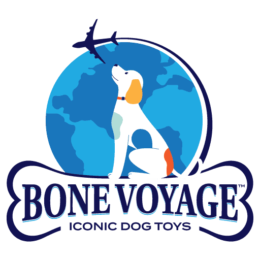 Logo for Bone Voyage featuring a white dog with orange ears and tail sitting in front of a globe, looking up at an airplane flying overhead.
