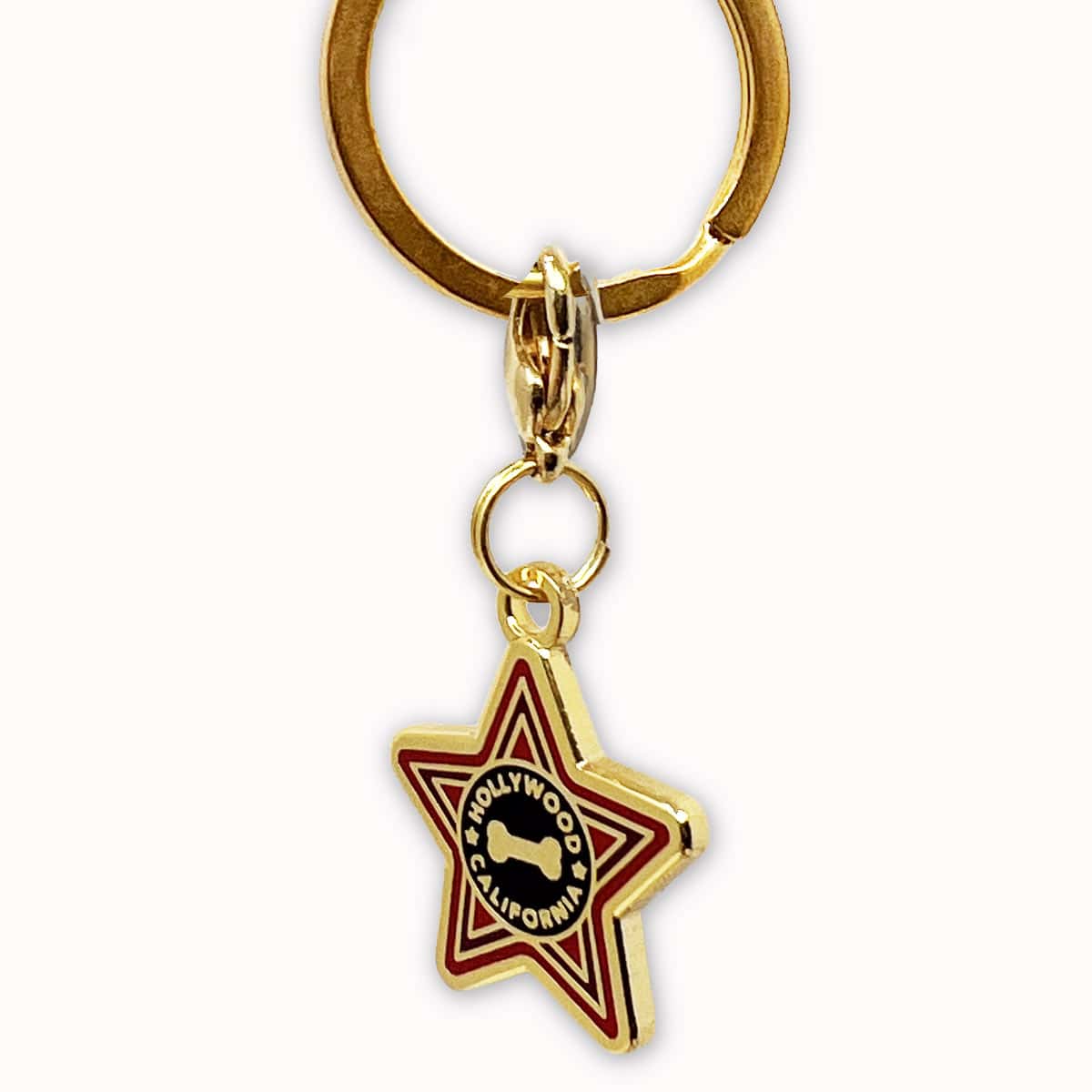 Hollywood Star Dog Collar Charm – California Pet Accessory Gold and red Hollywood star dog collar charm resembling a Walk of Fame star.